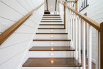 Light guided staircase to upper level of the house